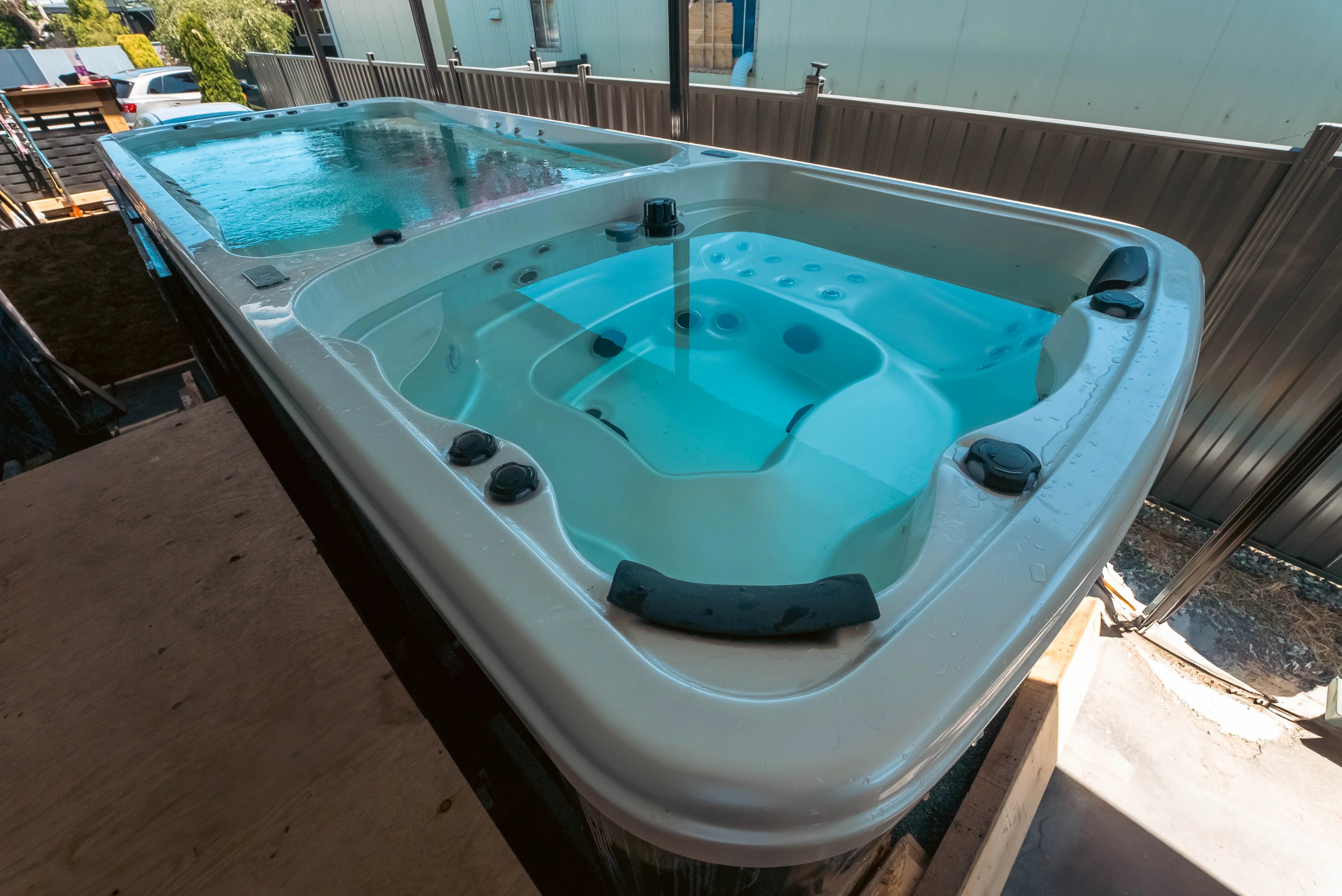 Luxx swim spa installed in backard.
